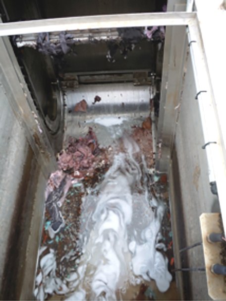 Solids removal after dye vat dump.