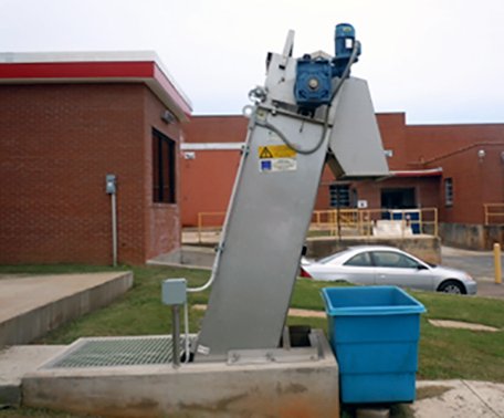 Perforated multi-rake screen installed at textile dying facility.